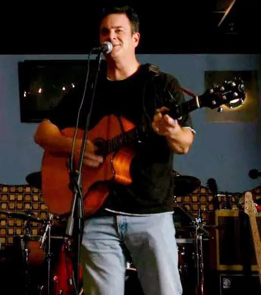 Solo acoustic act playing well-known hits from the 1950s - 2020s