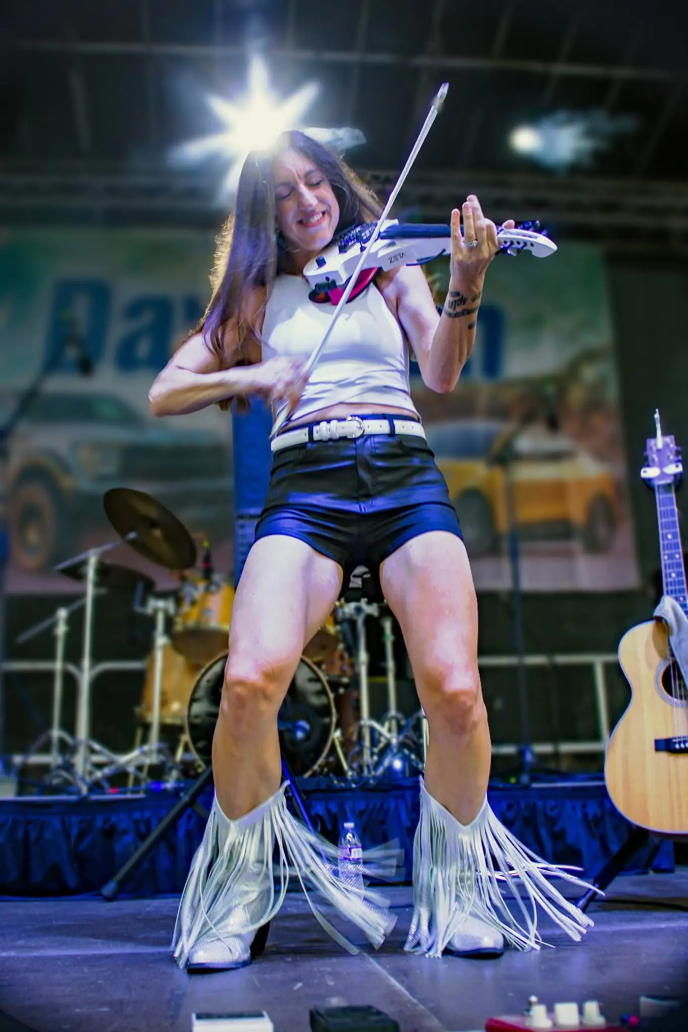 Guitar, electric violin, piano, percussion, looping, vocals 